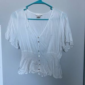 White ruffle blouse